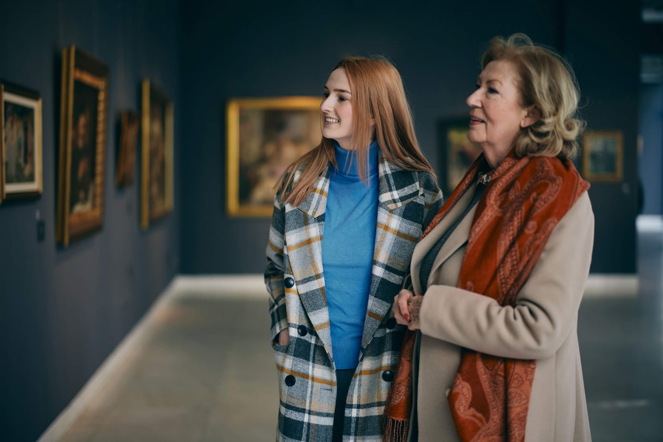 Two women looking at art at the Museum of Fine Arts in Boston